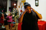 High on heroin, Raquel Rodriguez reacted as her daughters, Estrella (left) and Mimi, ran back and forth across her small living room. Tomorrow Raquel will go to the clinic and get her first dose of methadone, but tonight she worries that she wonÕt be able to do it.