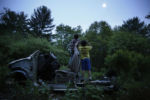 On the night of the eviction the boys climbed into a rusted Ford behind the horse pasture. Strider held a broken automotive hoses to his eyes like a pair of binoculars. He tipped his head upward. ÒWhatÕs on the moon?Ó Strider asked.