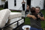 After months of searching for a new place to live a craigslist post had finally turned up a home they could afford. Anna Cunningham, of Skowhegan, arrived to the family's new home with a delivery of beds for the boys and couches and chairs for the family and Lanette grabbed her and pulled her in for a grateful hug.