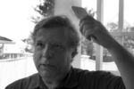 Cohen demonstrates the use of a shampoo brush.