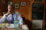U.S. Republican presidential candidate Jeb Bush listens to a question during an interview at Nonie's Restaurant in Peterborough, New Hampshire October 13, 2015.