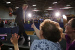U.S. Republican presidential candidate Donald Trump greets supporters as he takes the stage at a campaign town hall meeting in Rochester, New Hampshire September 17, 2015.