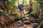 Bretton Woods, NH-09/07/15 -Ninety year-old Richard Dreselly from Topsham, Maine is the oldest man to climb Mt. Washington. He catches his balance while traversing large boulders on Crawford Path on the first day of the hike.