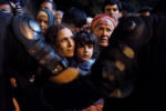 Women wait to board a train for refugees and migrants at the station in Tovarnik, Croatia. Though the trek is rough on all the migrants, physicians and aid workers say families Ñ particularly women, children, and the elderly Ñ present a special concern. The United Nations says more than 442,000 migrants, half of them Syrians, have poured into Europe this year. Increasingly they are seeing women and children on a route that had historically been dominated by men.