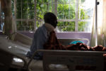 Samwell Mosota Omaiyo sits up in his bed on Sunday afternoon at the Texas Cancer Center in patient facility in Nairobi, Kenya on Sunday, Aug. 23, 2015. Nurses here are trained in palliative care and give round the clock care to over a dozen patients in this small medical building.
