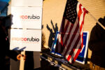 February 9, 2016 - Supporters of Donald Trump, Hillary Clinton and Marco Rubio talk to voters by the entrance of a polling station at the Manchester Health Department in Manchester, N.H.