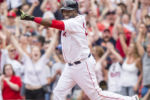 BOSTON, MA - MAY 14: David Ortiz #34 of the Boston Red Sox reacts after hitting a game winning walk-off single during the eleventh inning of a game against the Houston Astros on May 14, 2016 at Fenway Park in Boston, Massachusetts.