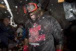 NEW YORK, NY - SEPTEMBER 28: David Ortiz #34 of the Boston Red Sox celebrates after clinching the American League East Division after a game against the New York Yankees on September 28, 2016 at Yankee Stadium in the Bronx borough of New York City.