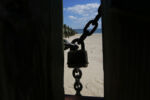 A locked gate near the L Street Bath House keeps people off the beach a day after the body of Kyzr Willis was found.
