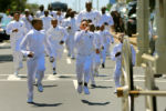 A group of young boys chase the horse-drawn hearse with Kyzr's casket down Blue Hill Ave. in Mattapan. KyzrÕs death prompted a host of new oversight measures at summer drop-in programs, from stricter staffing requirements to hourly head counts of children. ÒKyzr, heÕs saving lives today,Ó his uncle said at the boyÕs funeral. ÒAnother family will never have to go through this again.Ó