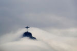 Clouds surround the Christ the Redeemer statue over Rio de Janeiro, Brazil, August 9, 2016.