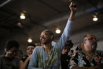 An audience member cheers as U.S. Democratic presidential nominee Hillary Clinton is introduced at a campaign rally in Coral Springs, Florida September 30, 2016.