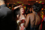 Eighteen year-old Precious Perez, who has been blind since brith, dances with her friend Maddy Wilson (R) at the Chelsea High School Prom in Boston, Massachusetts. May 21, 2016.