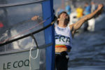 Pierre Le Coq of France celebrates after winning the bronze medal in the Men's RS:X Windsurfer at the 2016 Rio Summer Olympics in Rio de Janeiro, Brazil, August 14, 2016.