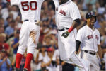 Farewell Big Papi - career final season of slugger David Ortiz
Boston Red Sox designated hitter David Ortiz, center, leaps as he is congratulated by Mookie Betts (50) after his three-run home run.