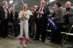 Sienna Szarek, 7, of Southern NH jumps up and down as NJ Governor Chris Christie arrives at a Town Hall and Rally inside the Automotive Building at Nashua Community College in Nashua, New Hampshire February 1, 2016.