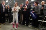 Sienna Szarek, 7, of Southern NH jumps up and down as NJ Governor Chris Christie arrives at a Town Hall and Rally inside the Automotive Building at Nashua Community College in Nashua, New Hampshire February 1, 2016.