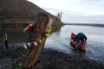 A man gets into his canoe after taking part in a prayer circle which capped a day of protest over the building of the Dakota Access Pipeline.