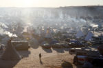 Sun rises over Oceti Sakowin camp in Cannon Ball, ND near the Standing Rock reservation.