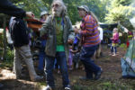 Rainbow Family elder Diamond Dave collects donations for food with the “magic hat.” At this year’s gathering near the town of Mount Tabor, Vermont, no money is exchanged, except for that dropped into the “magic hat’’ passed at communal meals.