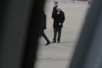 U.S. Democratic presidential candidate and U.S. Senator Bernie Sanders waits on the tarmac at the airport in North Kansas City, Missouri February 24, 2016.