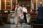 She finishes up representing a client before the judge at Orleans District Court during a civil matter.