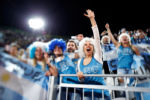 2016 BPPA PICTURES OF THE YEAR CONTEST IPTC CAPTION TEMPLATE
Argentina fans cheer for their team before taking on the Czech Republic in a Women's Beach Volleyball preliminary match at the 2016 Rio Summer Olympics on Copacabana Beach in Rio de Janeiro, Brazil, on August 10, 2016.