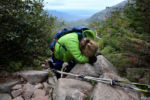 STORY SUMMARY- Her fellow hikers refer to her as ÒIron Will.Ó Stacey Kozel has hiked more than two-thirds of the Appalachian Trail, a grueling quest, and sheÕs trekking solo with a major disadvantage: She cannot walk on her own.
She was diagnosed with lupus at age 19, and KozelÕs battle with the autoimmune disease has left her with no function in her legs, limited function in her hands and arms, and an inability to digest food. Her hike, in other words, is a feat most told her was impossible.
The 41-year-old spent more than 60 hours over four days climbing toward the summit of Mount Katahdin in MaineÕs Baxter State Park, and the northern terminus of the Appalachian Trail. This is her journey.
CAPTION- Exhausted, Stacey Kozel, whose battle with Lupus has left her paralyzed, rests on the Saddle Trail during her attempt to summit Mount Katahdin in Baxter State Park, ME.