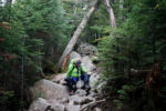 Stacey Kozel sits dejected on the Saddle Trail after her unsuccessful attempt to ascend Mount Katahdin in Baxter State Park, Maine on August 29, 2016.
After finally making it over the boulders the previous day, she was exhausted. At 6 p.m., after 12 hours of hiking, the light was fading. It began to rain. It was time to turn back. She would not make it up the mountain this time. She said, Òthe hardest part is the people. There are so many people counting on me to finish this. É ItÕs hard getting this far after everything I just did, crawling on my belly, to feel so close, it feels like I let everyone down.Ó
Stacey hiked through the night, away from the summit, headed back to camp.