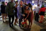 Edmar Goncalves and Jessica Pina share a laugh after celebrating a friends birthday at Candibar nightclub on Tremont St.