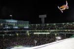 A snowboarder competes at the Big Air Event at Fenway Park in Boston Thursday, Feb. 11, 2016.