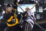 Boston Bruins right wing Jimmy Hayes (11) battles for position with Los Angeles Kings defenseman Derek Forbort (24) in front of the net during the second period of the Boston Bruins 1-0 win over the Los Angeles Kings at TD Garden, Dec. 18, 2016.