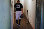 New York Yankees' Alex Rodriguez walks back down the tunnel to the clubhouse before their baseball game against the Boston Red Sox at Fenway Park in Boston Tuesday, Aug. 9, 2016.
