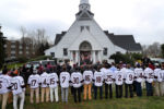 A funeral Mass was held at St. Patrick Church for Falmouth High School Hockey player James Lavin, 17, who died last week in a car accident along with his best friend, another hockey player. His teamates lined the outside of the church as FHS football players carried the casket from the church at the end of the Mass.