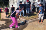 Tessa Pina poured boing water and mopped the blood off the sidewalk where Mateo Morales, 15 was stabbed to death on this corner in New Bedford, Massachhusetts. "His mother is going to drive by here everyday. You don't want to see your baby's blood on the street." Pina said. Pina is a neighbor of Morales' mother.