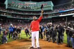 Retiring Red Sox slugger David Ortiz stands on the pitchers mound, full of emotion, as he salutes the fans at Fenway park following game 3 of the American League Division Series. It was his last game. The Cleveland Indians knocked the Red Sox out of the playoffs.