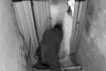 Show-goer slips on the steps leading into the basement. Teacher's Lounge, house venue in Allston.
