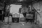 The crew prepares the sound system for Prom Night. Make Out Point, house venue in Allston.