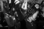 Party-goers dance to Drum and Bass music. Unknown house venue, Allston
