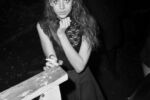 Miette smoking a cigarette at her bands record release show. Outside of Make Out Point, house venue in Allston.