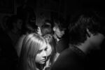 People seemingly lonesome in a sea of party-goers waiting for the next act. Oh! Frenchy, apartment venue in Back Bay.