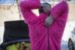 Feb. 14, 2017 – Galbraith, adjusts his Pinky the Gorilla suit before performing his second singing telegram of the day. In regards to working on major holidays , “I can either make one person happy or make everyone happy.”