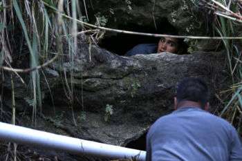 Corozal, Puerto Rico -- 10/01/2017 - In Corozal, people who got tired of waiting in long lines for water took matters into their own hands. Using PVC pipe to connect to a natural spring they filled containers with much needed drinking water. More than a week after Hurricane Maria devastated the tropical island with 150 mile-per-hour winds and heavy flooding much of the island is still struggling. Millions of people remain without electricity, food, or water that is safe to drink.