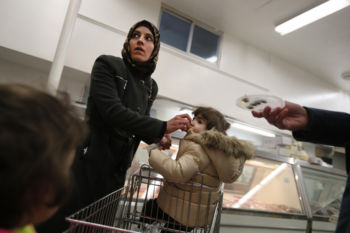 The Last Refugee: Through the Closing Door
4. In her first few days in America, Asmaa Hayani and her family felt like strangers in a strange land. A volunteer takes her to shop for the first time at a halal market. In this alien world, Asmaa felt conspicuous, especially when wearing the clothes that covered her body according to her faith. She was paralyzed by the possibility she would encounter someone who hated her because of it.