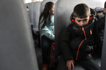 The Last Refugee: Through the Closing Door
5. Seven-year-old Ali Hayani rode the bus on his first day of school. His father, Abdulkaer, knew he and his nine- year- old brother were afraid. Everything was strange and intimidating. They knew no one, and could not speak the language. The games and rules that mattered here were mysteries to them.Ê