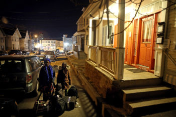 Vanisi and her children, Sarah and Dusenge, 15, arrive at their new home in Lowell in the middle of the night.
Twenty years in a refugee camp in Uganda will insulate a family from everyday conveniences that Americans take for granted. But here they were, bewildered and grateful Ñ a mother, father, and five children who received a waiver from President TrumpÕs ban on new arrivals.