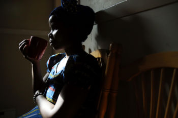 A month later, Vanisi sits quietly in the kitchen at her home in Lowell.
“You don’t have to worry about the new president,” said case manager Sabyne Denaud, who emigrated from Haiti. “You don’t have to worry about anything. You are safe here.”