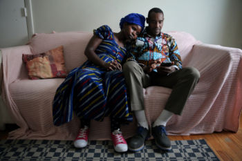 Vanisi and her husband Sendegeya relax on the couch at their home.
Still, the language barrier seems insurmountable at times, and the family still spends much of its time indoors in a neighborhood that is only beginning to become comfortable. “We always have people to comfort us,” Vanisi said. “And the good part is we have food and can sleep in peace,” Sendegeya added.