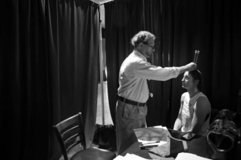 Dr. Peter DeBlasio uses a tuning fork to check AleksandraÕs hearing during a medical exam before the weigh-in and face-off. She said she gets irritated on weigh-in day because she hasnÕt eaten and is feeling the effects of training, ÒI was a little cranky.Ó