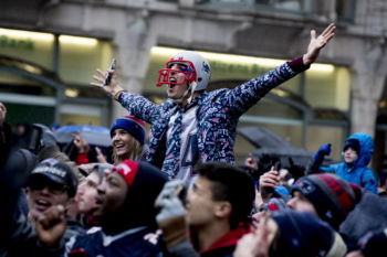 Fans on Boylston St. cheer the Patriots Super Bowl win.